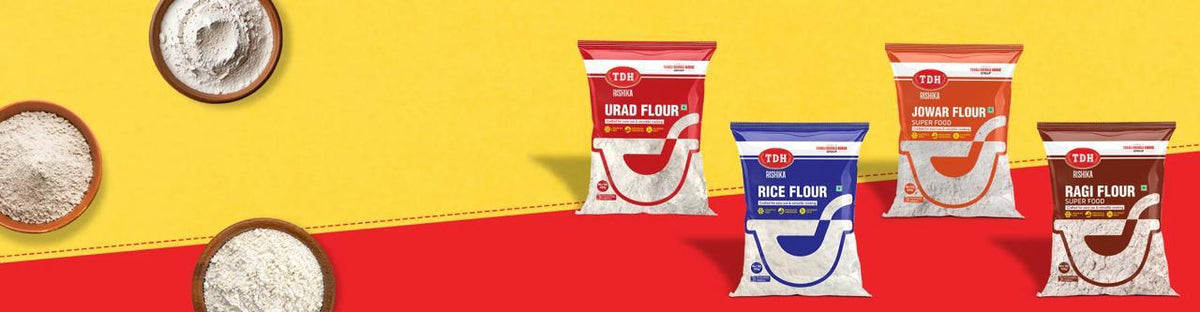Four bags of flour with different brands on a red and yellow background
