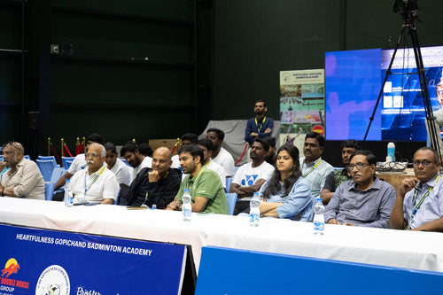 Group of people sitting.